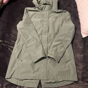 Green North Face raincoat